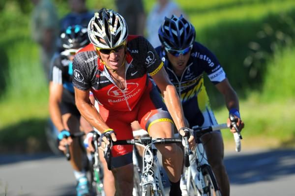 Lance Armstrong (RadioShack) leads Bjorn Leukemans (Vacansoleil) in their pursuit of Schleck and Carrara.