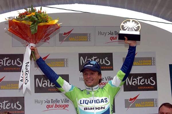 Danilo Di Luca (Liquigas) with bouquet and trophy