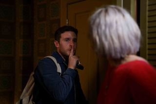 Iain De Caestecker as Gabe, urging Sam to stay silent.