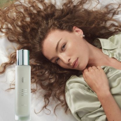 crown affair silver bottle and a model laying down with long curly hair