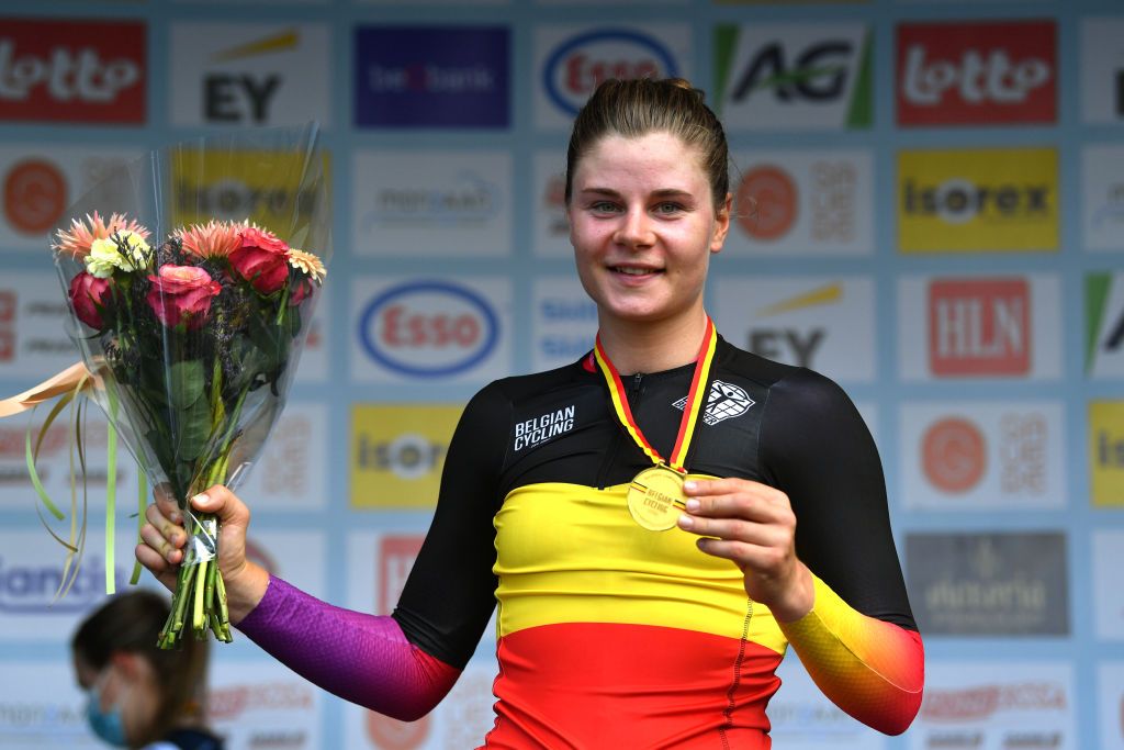 GAVERE BELGIUM JUNE 23 Gold medalist Lotte Kopecky of Belgium celebrates winning during the medal ceremony after the the 123rd Belgian Road Championship 2022 Womens Individual Time Trial a 23km individual time trial one day race from Gavere to Gavere ITT BelgianCycling140 on June 23 2022 in Gavere Belgium Photo by Luc ClaessenGetty Images