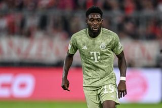 Alphonso Davies of Bayern Muenchen looks on during the Bundesliga match between FC Bayern München and Bayer 04 Leverkusen at Allianz Arena on September 15, 2023 in Munich, Germany.