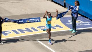 a photo of Peres Jepchirchir winning the boston marathon 22