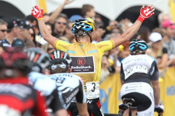Chris Horner (RadioShack) celebrates his GC win across the line.
