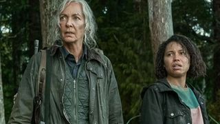 Allison Janney as Lou and Jurnee Smollett as Hannah standing in the woods in Lou