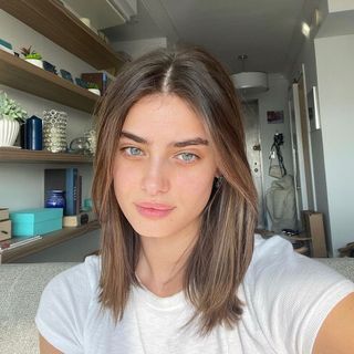 Taylor Hill with highlighted brunette hair