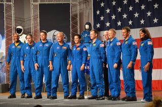NASA's first commercial crews for Boeing and SpaceX spacecraft, from left to right: Victor Glover, Mike Hopkins, Bob Behnken, Doug Hurley, Nicole Mann, Chris Ferguson, Eric Boe, Josh Cassada and Suni Williams.