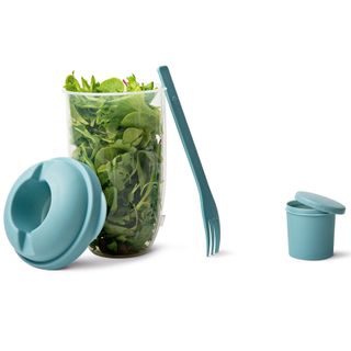 salad with salad bowl and plastic forks