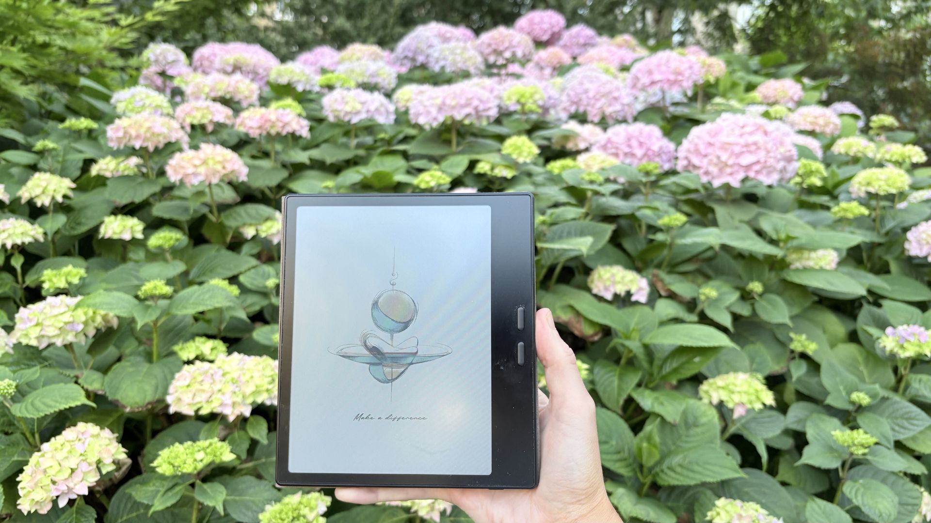 BOOX Go Colour Gen 2 eReader on a flower bed