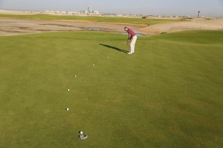 Point of entry on breaking putts