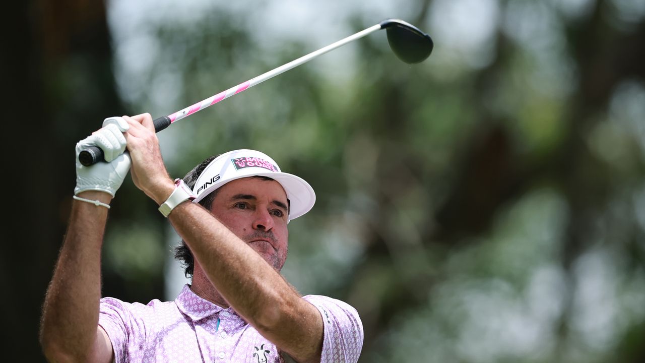 Bubba Watson hits a fairway wood
