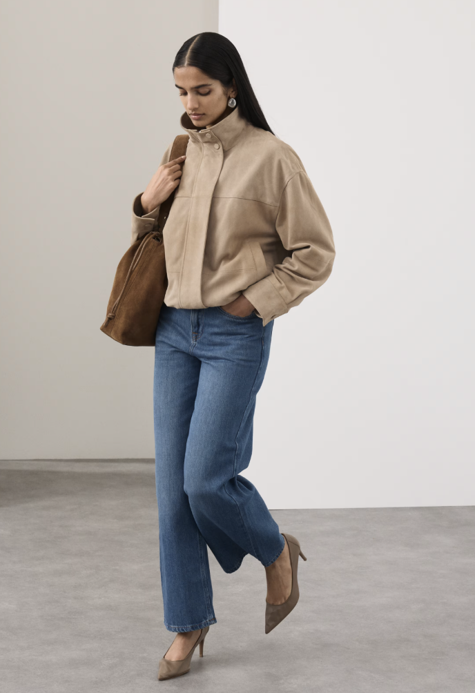 Image of the Marks and Spencers spring fashion trends 2026. The model wears the Suede Funnel Neck Blouson Jacket