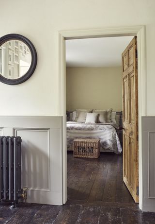 door to bedroom in converted Irish schoolhouse by the canal