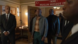 Maurice Jones as Brother Omar with others in a mosque in Godfather of Harlem season 3