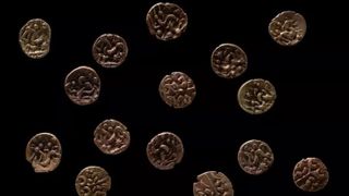 A collection of ancient gold coins