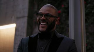 Tyler Perry smiling in press photo for Maxine's Baby: The Tyler Perry Story