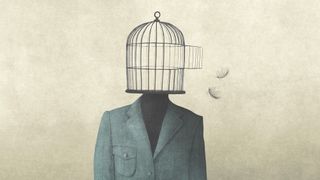 A man in a suit with a bird cage for a head