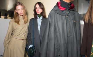 women in grey coat