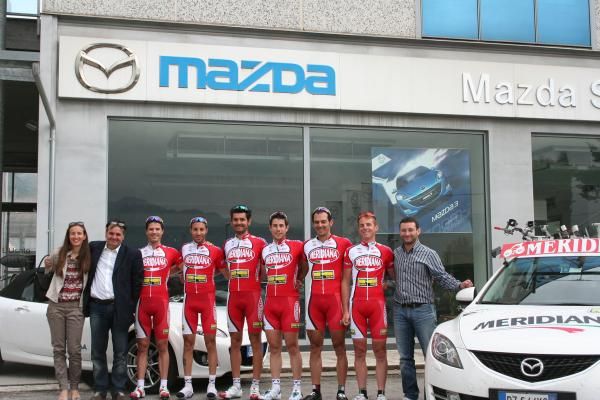 Ricco has a photo op with his new team