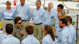 Princess Anne talks to the crew before officially naming the Save The Children yacht for the Global Challenge Round The World yacht race 2004-2005 at St Katharine Docks in London, 2004