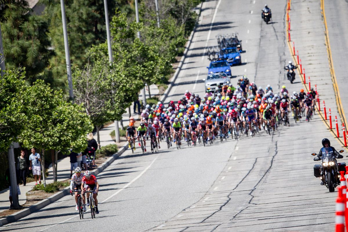 Two riders try to get a gap on the field.