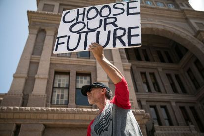 Man protests outside Texas capitol in Austin