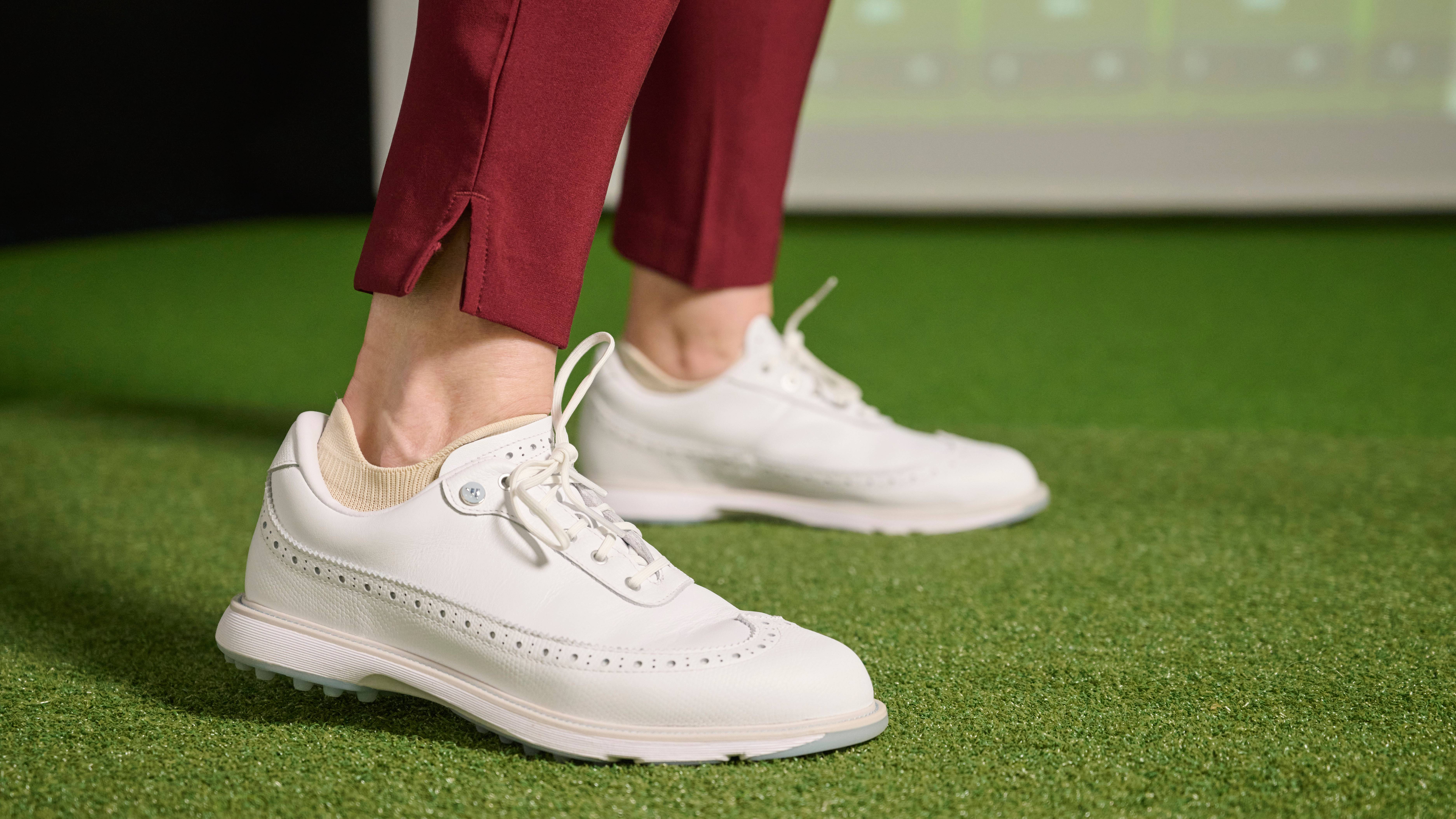 Katie Dawkins tapping heels up and down