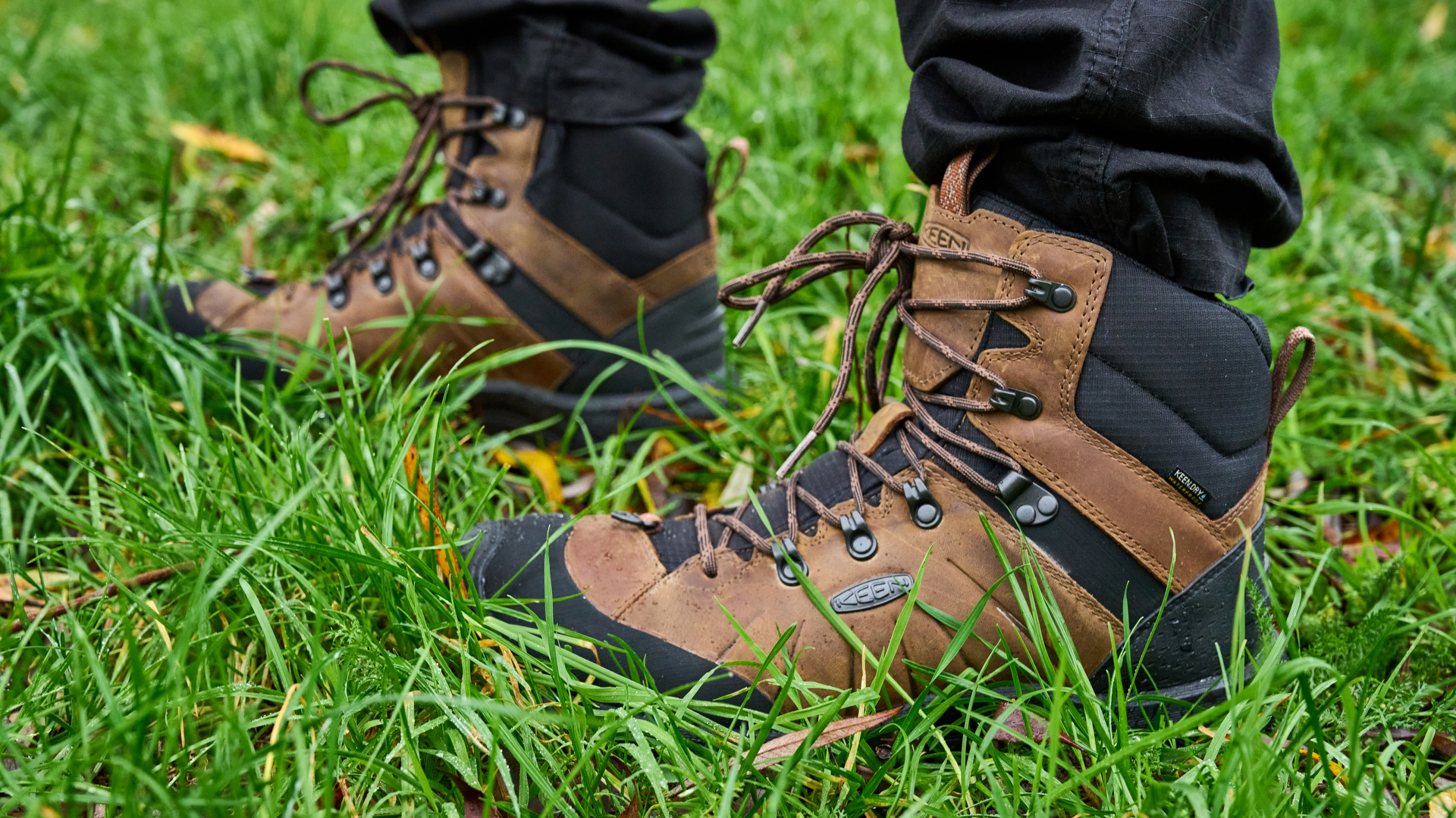 The Keen Revel IV being worn among grass