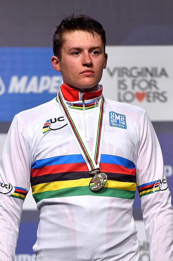 Felix Gall (Austria) in the rainbow jersey and wearing the gold medal around his neck