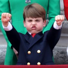 Prince Louis riding an imaginary motorcycle at Trooping the Colour