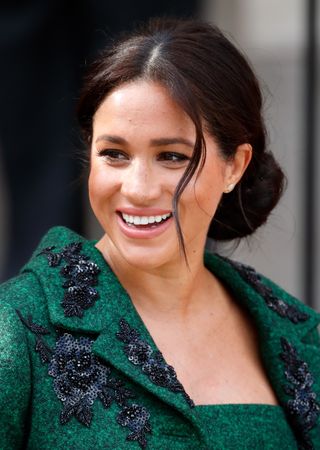 Meghan Markle was often criticised for wearing her hair in a messy bun, similar to the style Kate wore this week