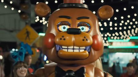 A smiling Freddy Fazbear in Five Nights at Freddy's 2