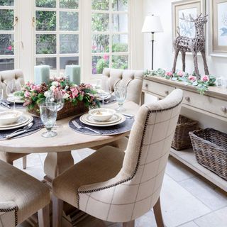 dinning room with white wall and chair