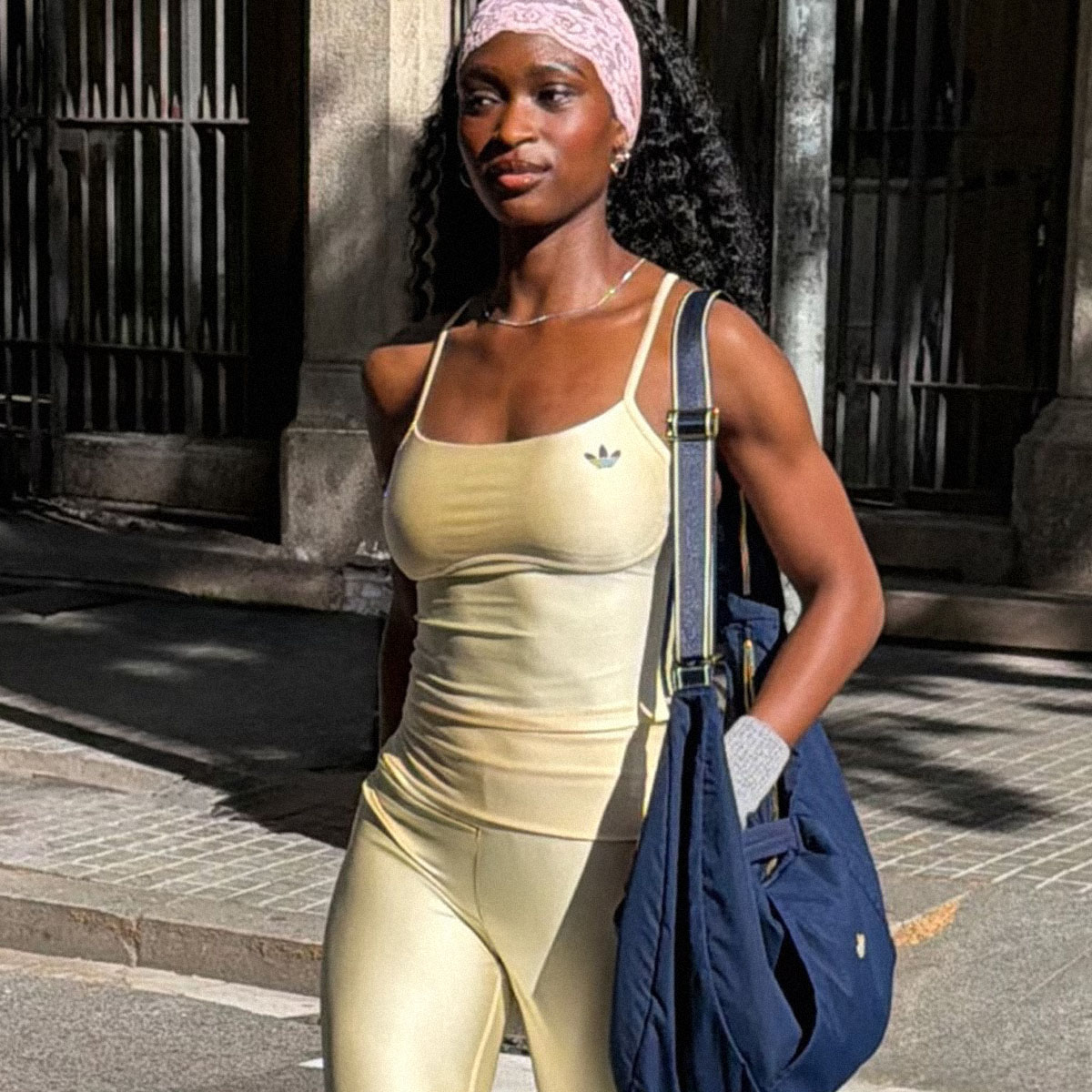 woman wearing adidas originals collection