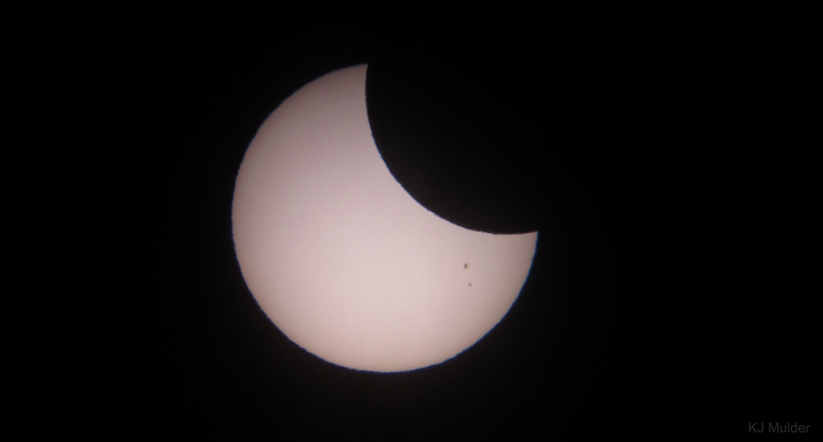 Partial solar eclipse shows the moon taking a 