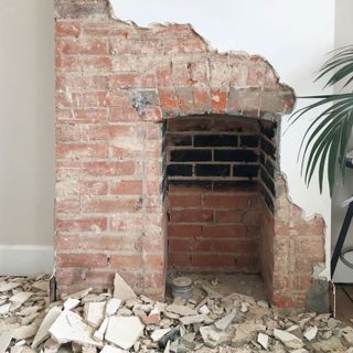 removing plaster from a brick fireplace