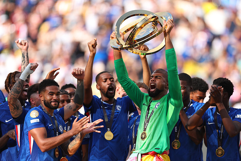 EAST RUTHERFORD, NEW JERSEY - JULY 13: Robert Sanchez of Chelsea lifts the trophy during the FIFA Club World Cup 2025 final match between Chelsea FC and Paris Saint-Germain at MetLife Stadium on July 13, 2025 in East Rutherford, United States. (Photo by Robbie Jay Barratt - AMA/Getty Images)