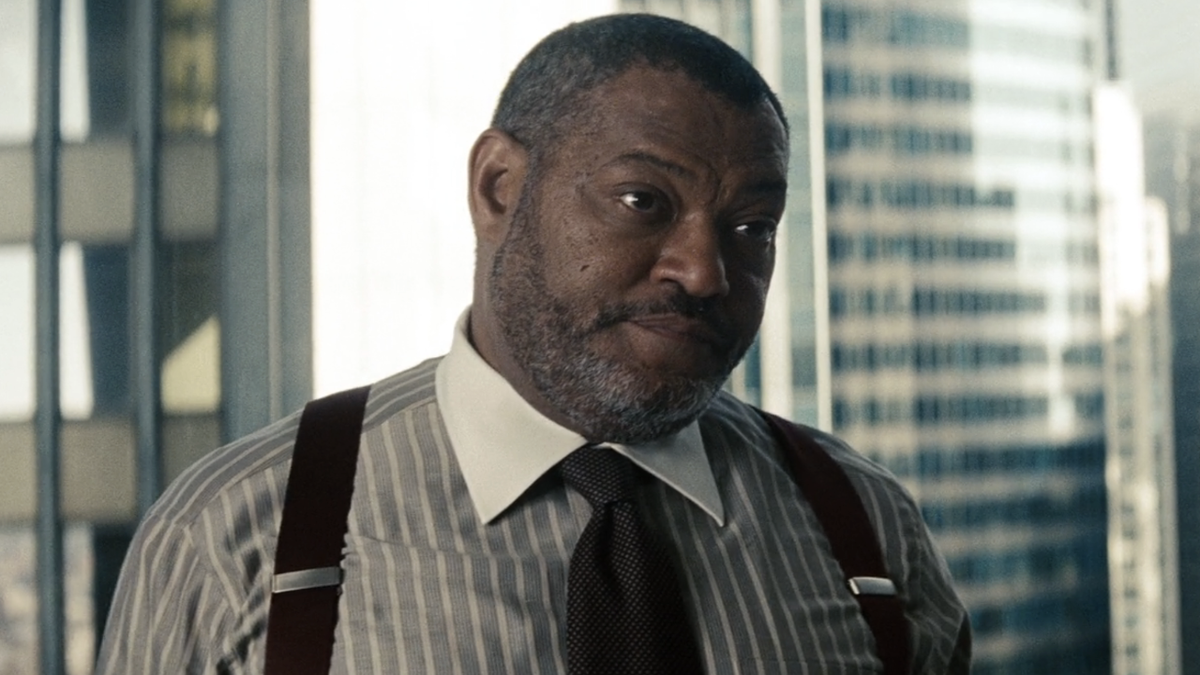 Perry White (Laurence Fishburne) speaks with Lois Lane in Man of Steel