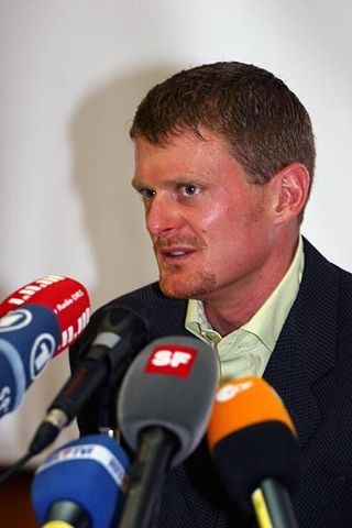 Floyd Landis at the center of attention.
