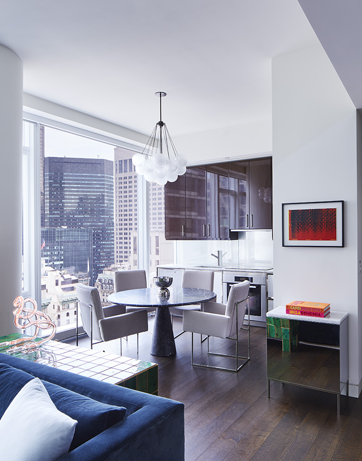 bright interior with colour and art in Baccarat Residence NYC Architect Joe Serrins Studio