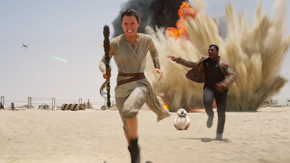 Rey and Finn running in Star Wars: The Force Awakens