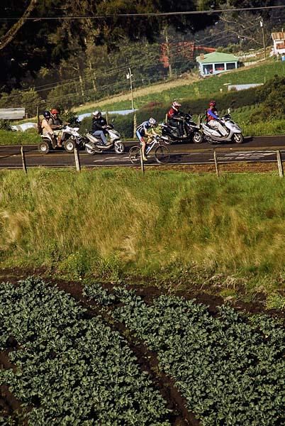 Jeremiah Bishop (MonaVie Cannondale) is able to break away from the group and sprints up the Volcanoes.