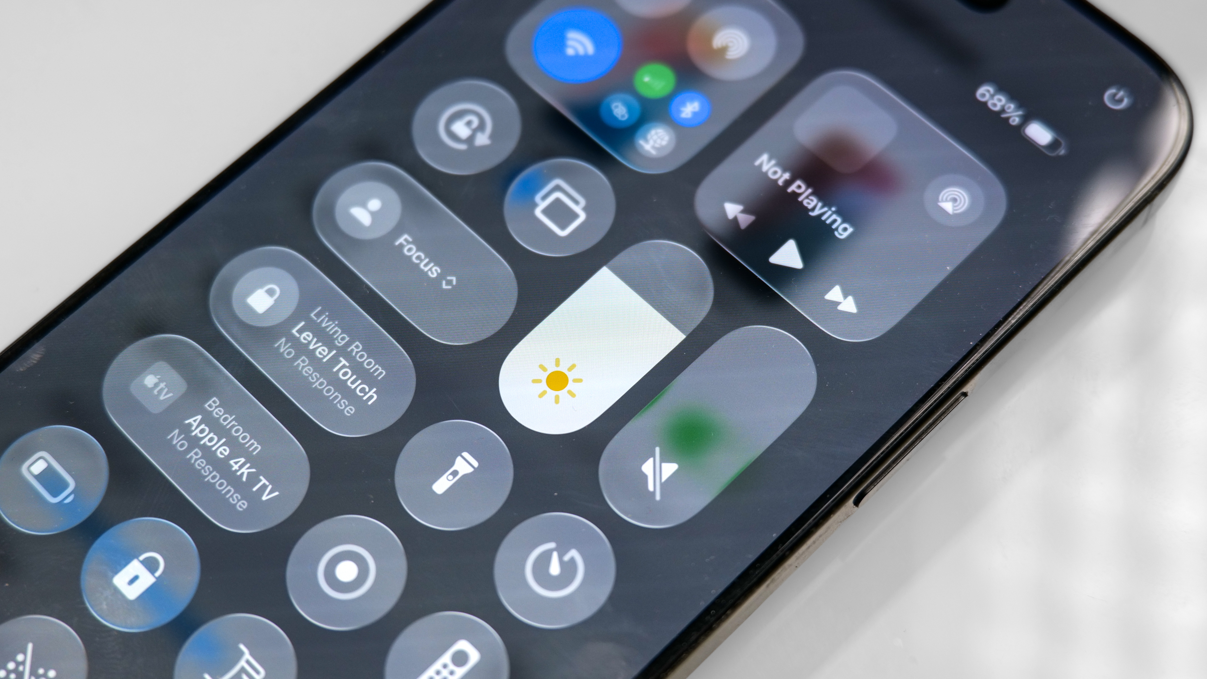 iPhone showing Auto-Brightness setting.
