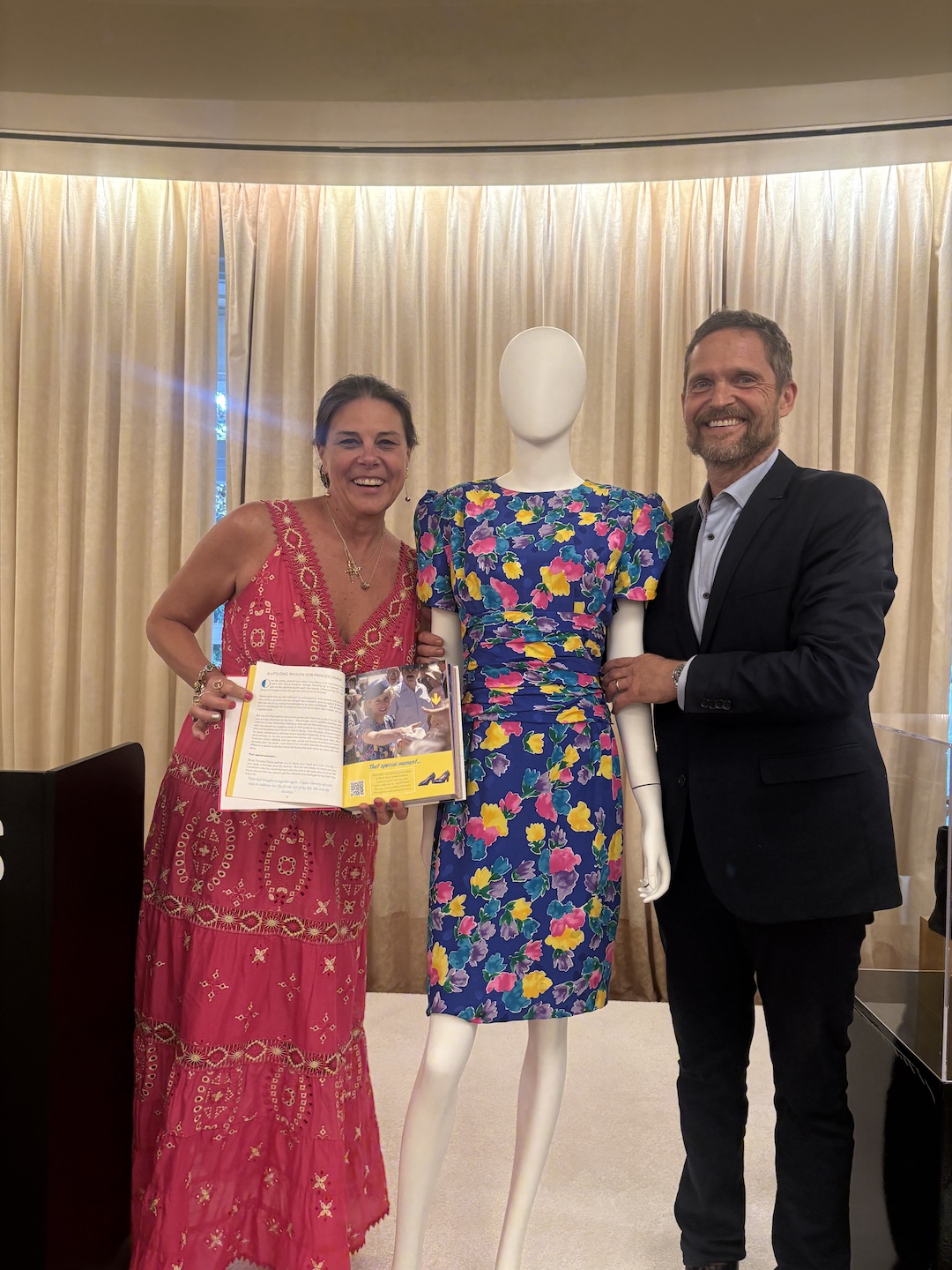 Renae Plant and Livinio Stuyck Sanchez posing with Princess Diana&#039;s floral Caring Dress