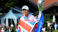 Lydia Ko with the trophy after winning the 2015 Evian Championship GettyImages-488039026.jpg