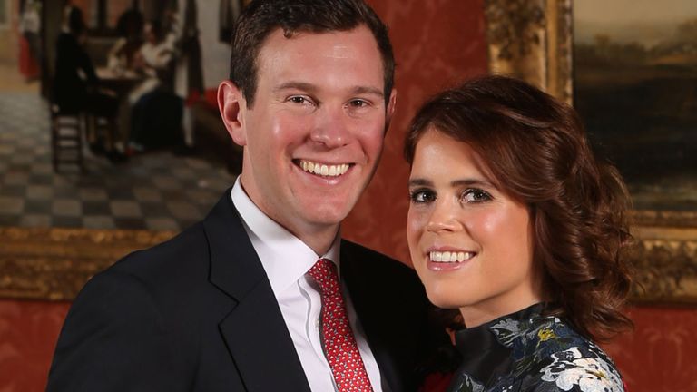 Princess Eugenie and Jack Brooksbank pose in the Picture Gallery at Buckingham Palace after they announced their engagement