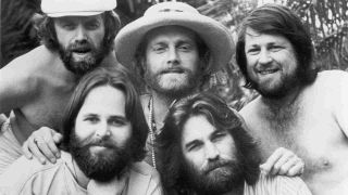 The Beach Boys posing for a group photograph in 1976