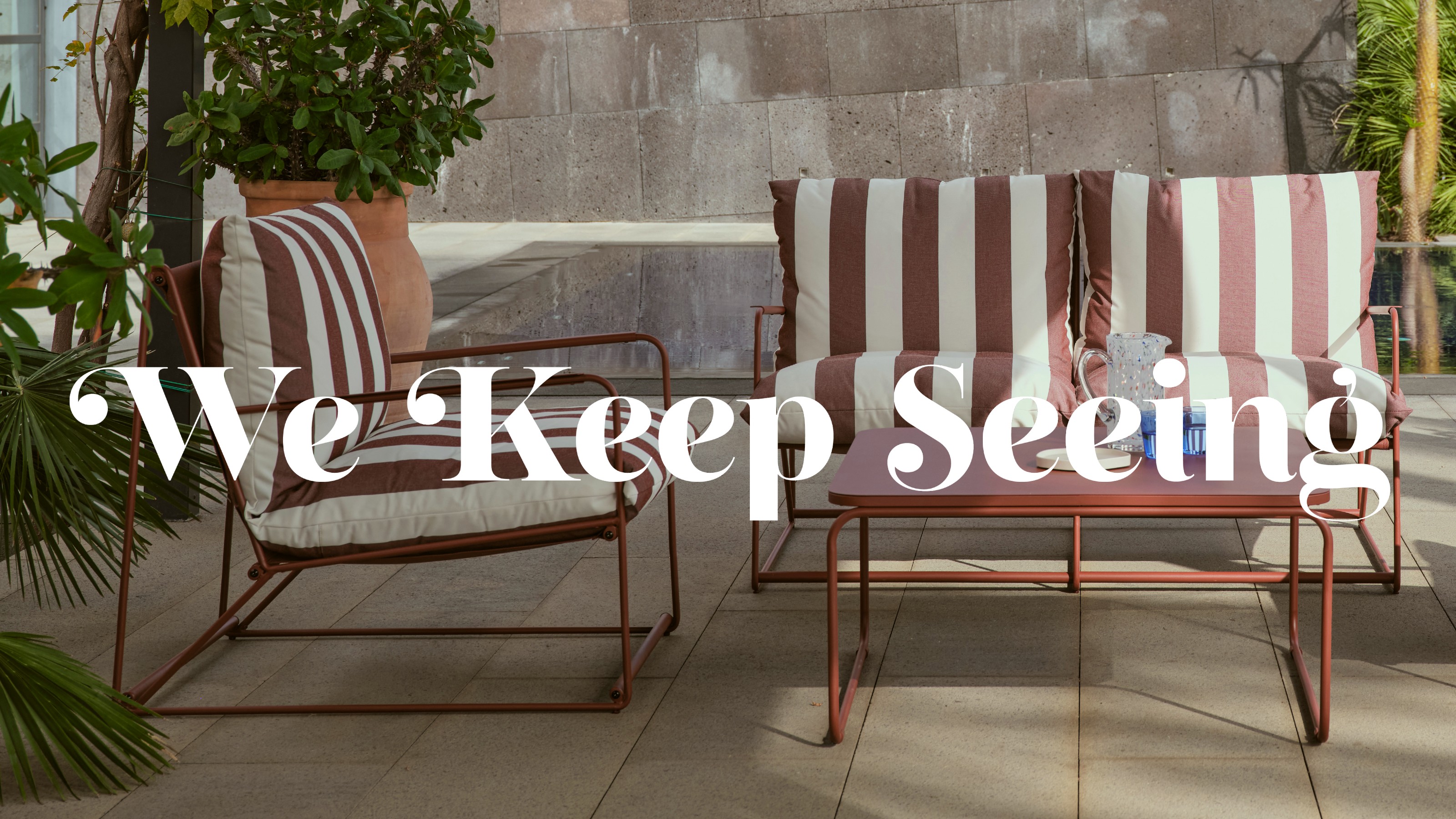 Swyft striped Garden Sofa Set 03 on a patio with white writing reading 'We Keep Seeing' across