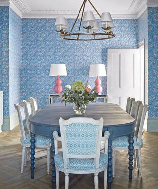 Blue monochrome dining room with wallpaper