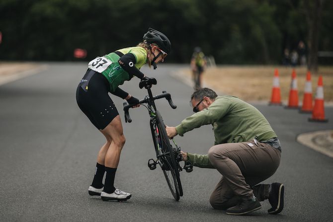 Emily Watts (Subaru Giant Women) receives mechanical assistance